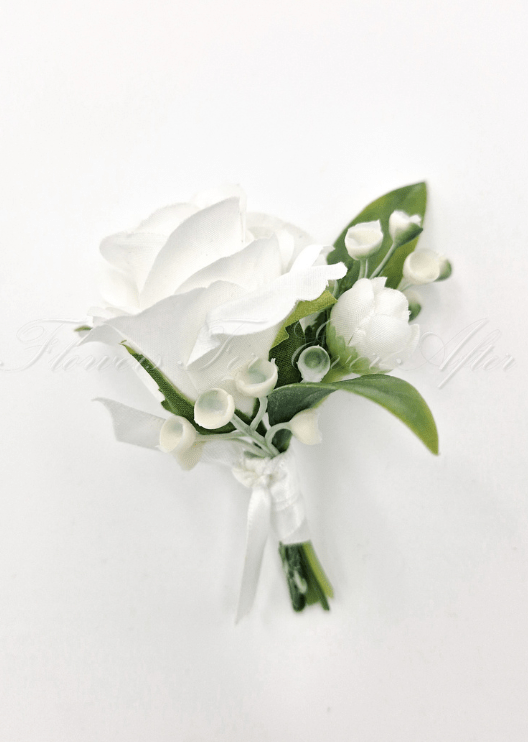 Artificial wedding boutonniere with a white faux rose, white berry sprigs, green leaves and a white ribbon bow. For formals, proms and ball occasions. Made in Melbourne by Flowers For Ever After, shipping Australia and Worldwide.