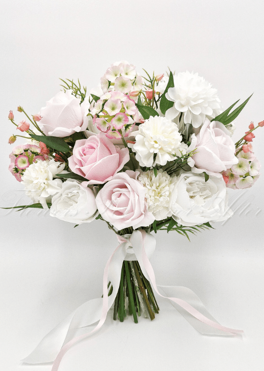 Artificial wedding bouquet with mixed faux blooms, green leaves and a ribbon-wrapped handle. Made in Melbourne by Flowers For Ever After, shipping Australia and Worldwide.