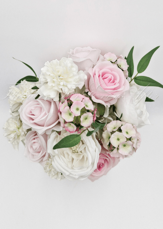 Artificial wedding bouquet, angled view of mixed faux flowers and green leaves. Made in Melbourne by Flowers For Ever After, shipping Australia and Worldwide.