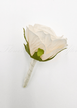 Artificial wedding boutonniere with a cream faux rosebud, green sepals and an ivory-wrapped stem. For formals, proms and ball occasions. Made in Melbourne by Flowers For Ever After, shipping Australia and Worldwide.