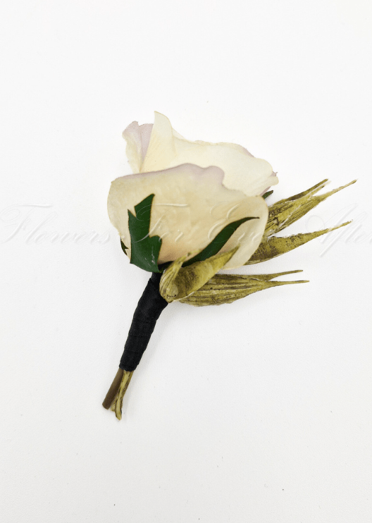 Artificial wedding boutonniere with a cream faux rosebud, green sepals and a black-wrapped stem. For formals, proms and ball occasions. Made in Melbourne by Flowers For Ever After, shipping Australia and Worldwide.