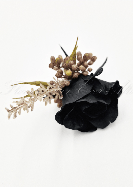 Artificial wedding boutonniere, top view of a black faux rosebud with brown berries and pale sprigs. For formals, proms and ball occasions. Made in Melbourne by Flowers For Ever After, shipping Australia and Worldwide.