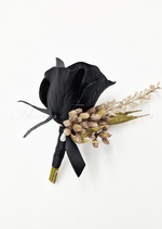Artificial wedding boutonniere with a black faux rosebud, brown berry sprigs, pale filler flowers and a black ribbon bow. For formals, proms and ball occasions. Made in Melbourne by Flowers For Ever After, shipping Australia and Worldwide.