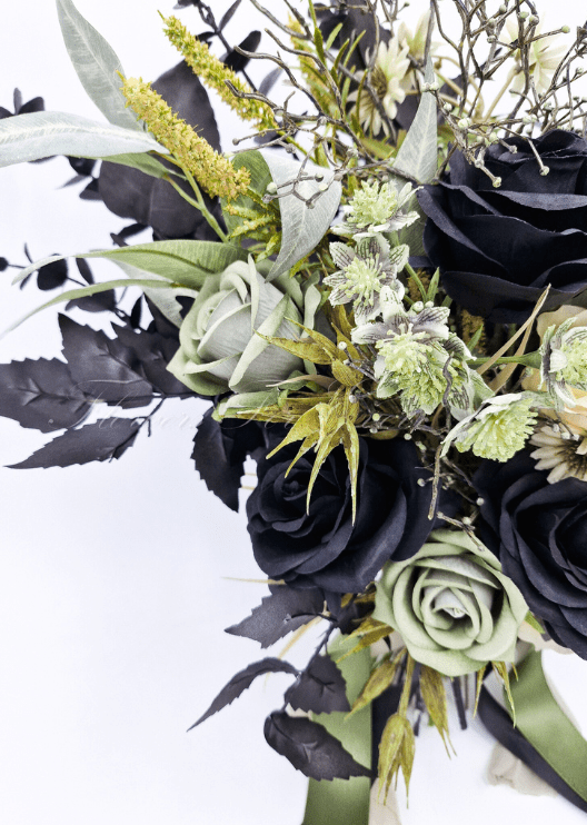 Artificial wedding bouquet close-up with black and sage faux roses, white daisies and branching pale sprigs. Made in Melbourne by Flowers For Ever After, shipping Australia and Worldwide.