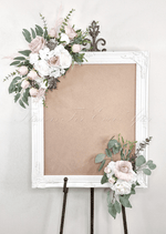 Artificial wedding sign display with two clusters of blush and white faux roses, white hydrangea and eucalyptus at opposite corners. Made in Melbourne by Flowers For Ever After, shipping Australia and Worldwide.