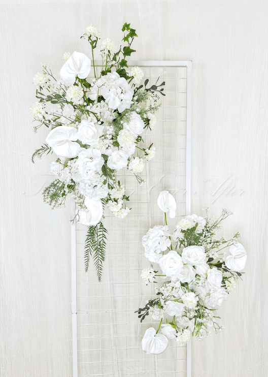 Artificial wedding ceremony arrangement, side view of mixed faux flowers and cascading greenery. Made in Melbourne by Flowers For Ever After, shipping Australia and Worldwide.