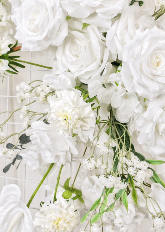 Artificial wedding ceremony floral arrangement close-up with mixed faux flowers and green foliage. Made in Melbourne by Flowers For Ever After, shipping Australia and Worldwide.