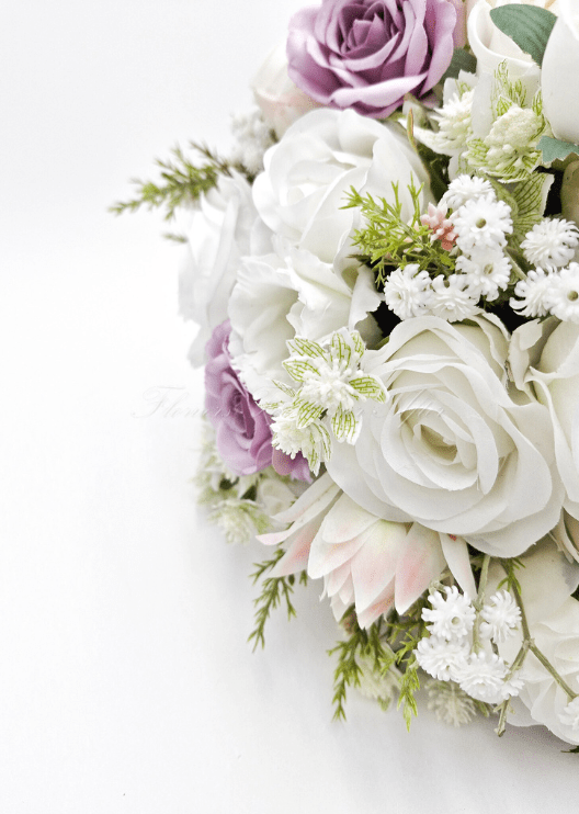 Artificial wedding bridesmaid posy with mixed faux blooms, green foliage and ribbon-wrapped stems. Made in Melbourne by Flowers For Ever After, shipping Australia and Worldwide.