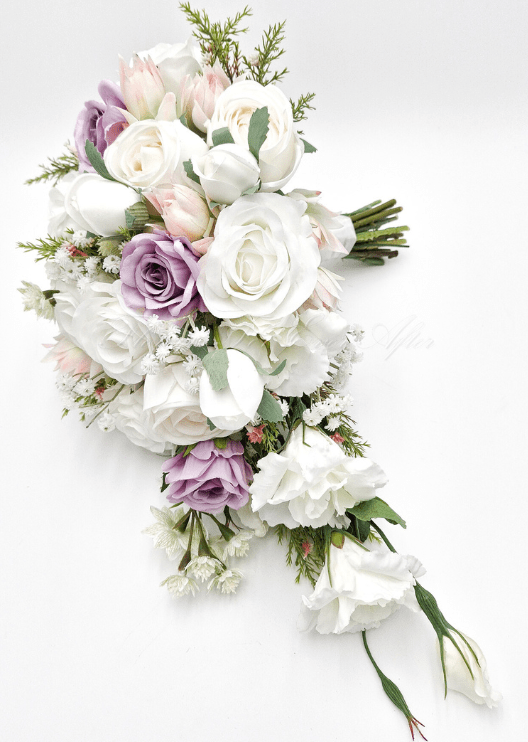 Artificial wedding bridesmaid posy, angled view of mixed faux flowers and green leaves. Made in Melbourne by Flowers For Ever After, shipping Australia and Worldwide.