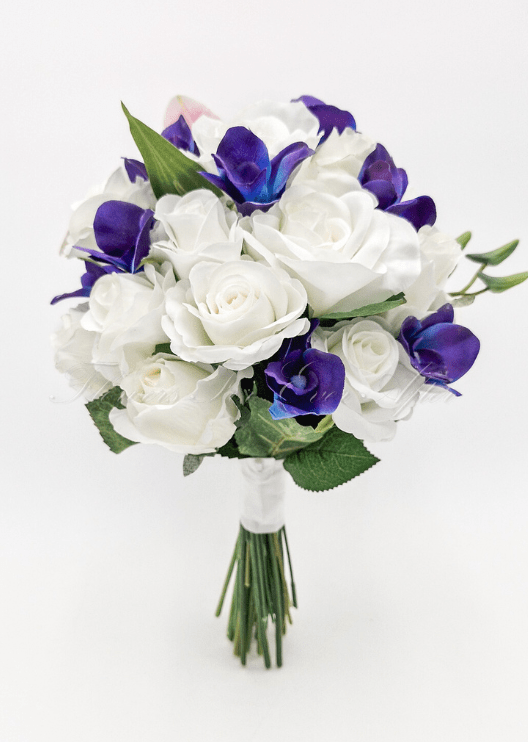 Artificial wedding bridal bouquet with pink faux lilies, purple orchids, smaller flowers and greenery. Made in Melbourne by Flowers For Ever After, shipping Australia and Worldwide.