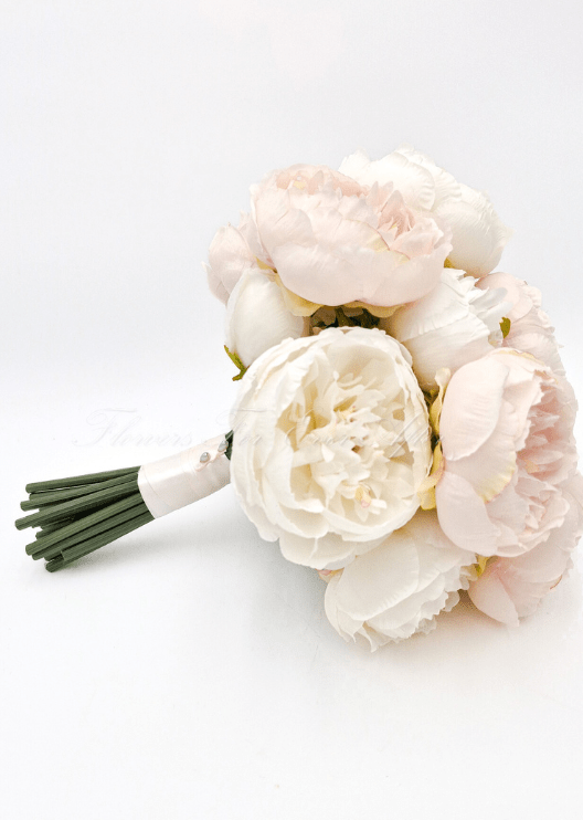 Artificial wedding bridal bouquet close-up showing white and pale blush faux peony petals and smaller blooms. Made in Melbourne by Flowers For Ever After, shipping Australia and Worldwide.