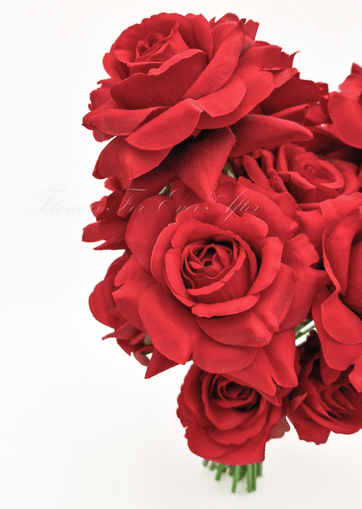 Artificial wedding bridal bouquet, angled view of mixed faux roses, small flowers and green leaves. Made in Melbourne by Flowers For Ever After, shipping Australia and Worldwide.
