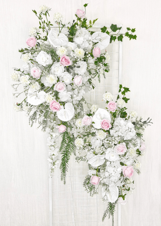 Artificial wedding ceremony floral pair with pink and white faux roses, white anthuriums, hydrangea, small white flowers and trailing greenery. Made in Melbourne by Flowers For Ever After, shipping Australia and Worldwide.