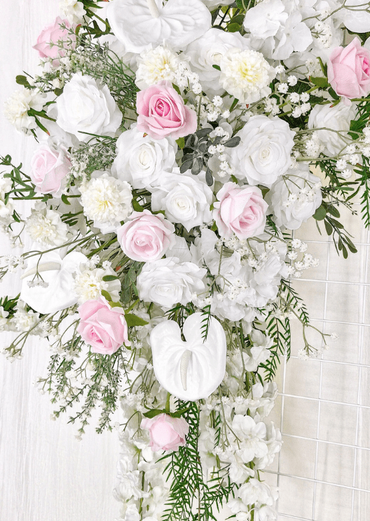 Artificial wedding ceremony floral close-up with pink and white faux roses, white anthuriums, hydrangea and delicate white flowers. Made in Melbourne by Flowers For Ever After, shipping Australia and Worldwide.