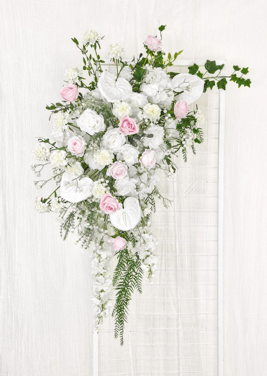 Artificial wedding ceremony arrangement with pink and white faux roses, white anthuriums, hydrangea and long trailing greenery. Made in Melbourne by Flowers For Ever After, shipping Australia and Worldwide.