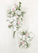 Artificial wedding ceremony floral pair, angled view of pink and white faux roses, white anthuriums, hydrangea and cascading greenery. Made in Melbourne by Flowers For Ever After, shipping Australia and Worldwide.