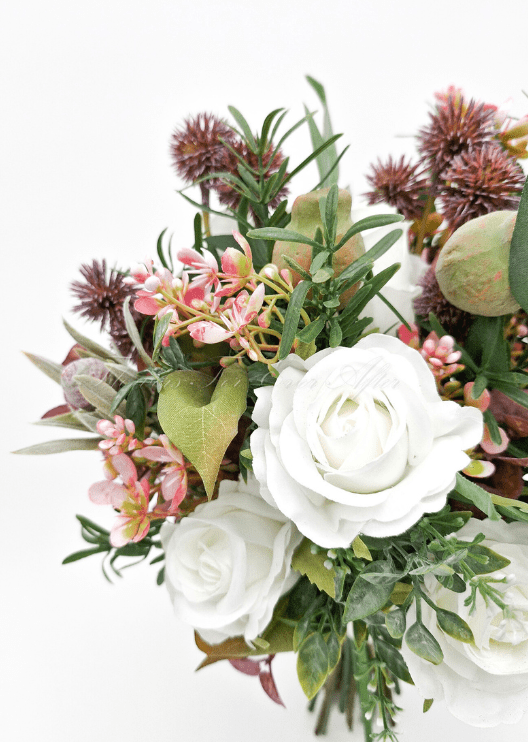 Artificial wedding bridesmaid bouquet, front view of native-style faux flowers and green leaves. Made in Melbourne by Flowers For Ever After, shipping Australia and Worldwide.
