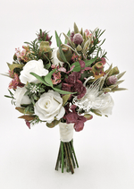 Artificial wedding bridesmaid bouquet with native-style faux blooms, small flowers and green foliage. Made in Melbourne by Flowers For Ever After, shipping Australia and Worldwide.