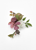 Artificial wedding boutonniere close-up showing native-style faux flowers and green leaves. For formals, proms and ball occasions. Made in Melbourne by Flowers For Ever After, shipping Australia and Worldwide.