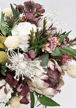 Artificial wedding bridal bouquet with native-style faux blooms, green foliage and exposed stems. Made in Melbourne by Flowers For Ever After, shipping Australia and Worldwide.
