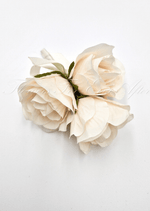 Artificial wedding pin corsage, top view of three cream faux roses and green sepals. For formals, proms and ball occasions. Made in Melbourne by Flowers For Ever After, shipping Australia and Worldwide.