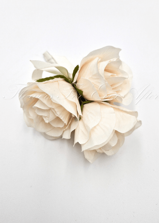 Artificial wedding pin corsage, top view of three cream faux roses and green sepals. For formals, proms and ball occasions. Made in Melbourne by Flowers For Ever After, shipping Australia and Worldwide.