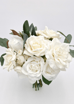Artificial wedding bridesmaid bouquet, top view of ivory faux roses, pale blooms, eucalyptus and brown magnolia leaves. Made in Melbourne by Flowers For Ever After, shipping Australia and Worldwide.