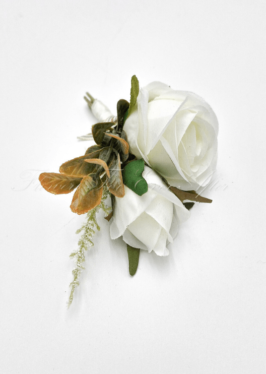 Artificial wedding boutonniere, top view of an ivory faux rose, small white flower and brown-green foliage. For formals, proms and ball occasions. Made in Melbourne by Flowers For Ever After, shipping Australia and Worldwide.
