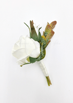 Artificial wedding boutonniere with an ivory faux rose, brown-green foliage and an ivory-wrapped stem. For formals, proms and ball occasions. Made in Melbourne by Flowers For Ever After, shipping Australia and Worldwide.