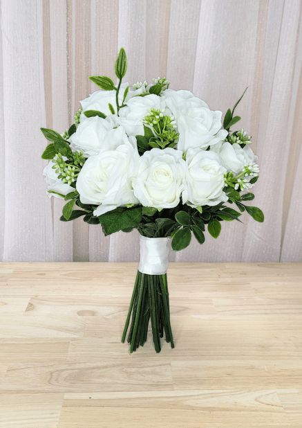 Artificial wedding bouquet, reverse view of white faux roses and peonies, tiny white buds and green leaves. Made in Melbourne by Flowers For Ever After, shipping Australia and Worldwide.