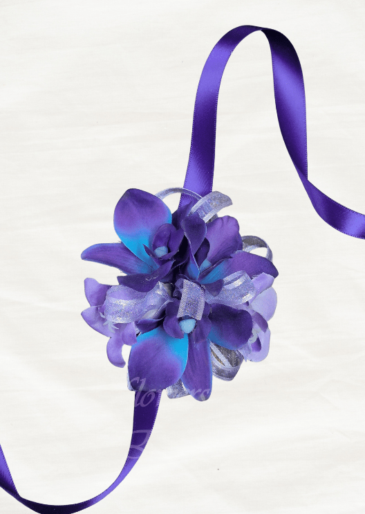 Artificial wedding wrist corsage, angled view of purple and blue faux orchids with pale feathery accents and dark ribbons. For formals, proms and ball occasions. Made in Melbourne by Flowers For Ever After, shipping Australia and Worldwide.