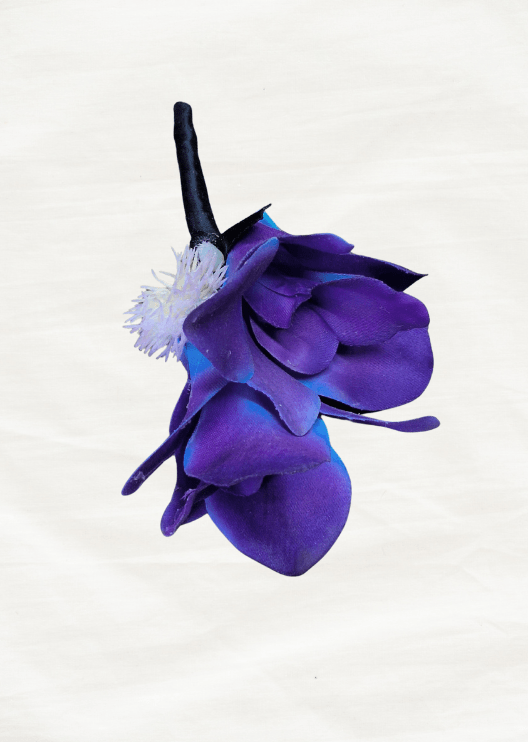Artificial wedding boutonniere, angled view of purple and blue faux orchid petals and a pale feathery accent. For formals, proms and ball occasions. Made in Melbourne by Flowers For Ever After, shipping Australia and Worldwide.