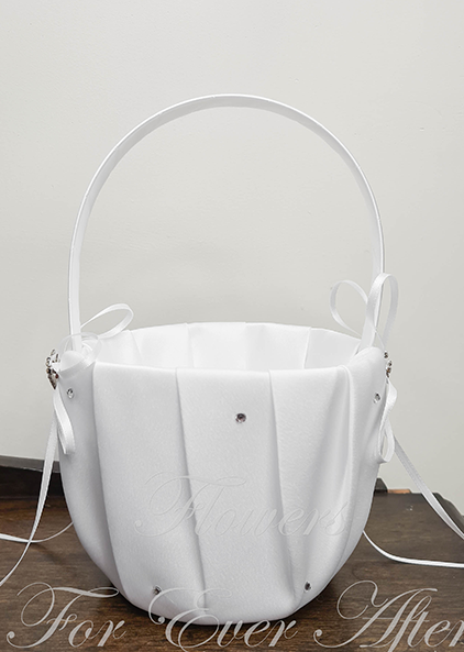 Artificial wedding flower and faux petal basket, full view of white fabric panels, ribbon-wrapped handle, small gems and long ribbon tails. Made in Melbourne by Flowers For Ever After, shipping Australia and Worldwide.