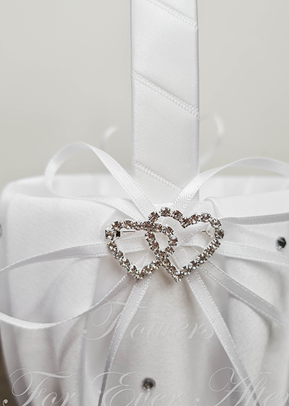Artificial wedding flower and faux petal basket detail showing white ribbon bow, twin-heart jewel accent and small sparkling gems. Made in Melbourne by Flowers For Ever After, shipping Australia and Worldwide.