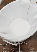 Artificial wedding flower and faux petal basket, overhead view of an empty white fabric-lined interior and ribbon-wrapped handle. Made in Melbourne by Flowers For Ever After, shipping Australia and Worldwide.