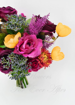 Artificial wedding bridesmaid bouquet with burgundy and pink faux roses, yellow flowers, green thistle and grey-green filler sprigs. Made in Melbourne by Flowers For Ever After, shipping Australia and Worldwide.