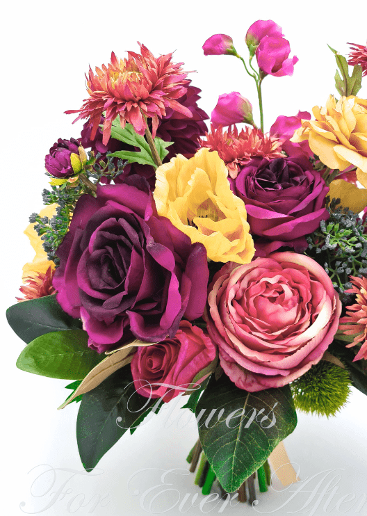Artificial wedding bridal bouquet close-up with burgundy and dusty pink faux roses, yellow blooms and coral flowers. Made in Melbourne by Flowers For Ever After, shipping Australia and Worldwide.