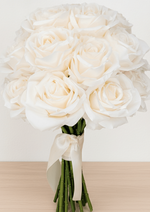 Artificial wedding bridal bouquet with ivory faux roses, ivory ribbon bow and gathered green stems. Made in Melbourne by Flowers For Ever After, shipping Australia and Worldwide.