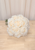 Artificial wedding bouquet, overhead view of rounded ivory faux roses and densely layered petals. Made in Melbourne by Flowers For Ever After, shipping Australia and Worldwide.