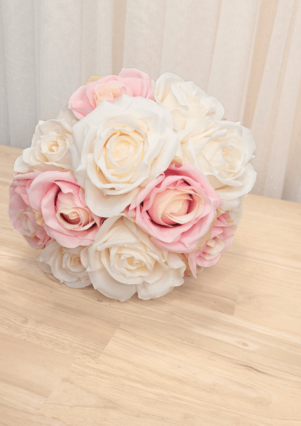 Artificial wedding bouquet, overhead view of pink and ivory faux roses with layered petals. Made in Melbourne by Flowers For Ever After, shipping Australia and Worldwide.