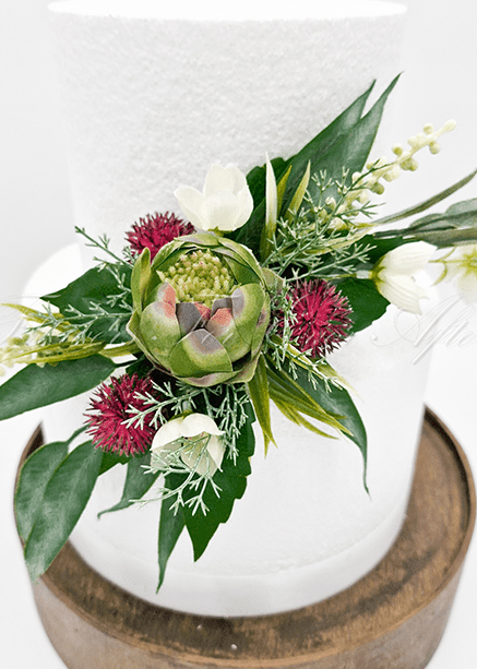 Artificial wedding cake flower set with green faux protea blooms and native-style leaves. For birthday, event and celebration cakes. Made in Melbourne by Flowers For Ever After, shipping Australia and Worldwide.