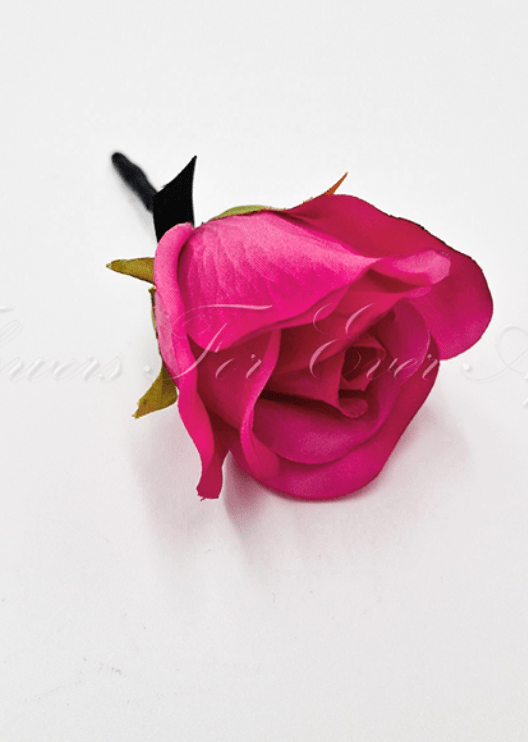 Artificial wedding boutonniere, top view of a hot pink faux rose with small pale flowers. For formals, proms and ball occasions. Made in Melbourne by Flowers For Ever After, shipping Australia and Worldwide.