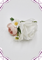 Artificial wedding boutonniere, top view of a white faux rose, pale pink rosebud and small white daisies. For formals, proms and ball occasions. Made in Melbourne by Flowers For Ever After, shipping Australia and Worldwide.