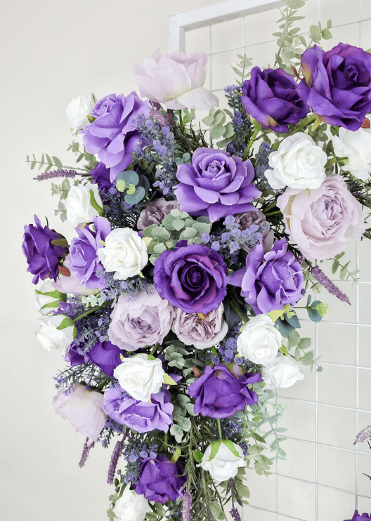 Artificial wedding ceremony arrangement close-up showing purple faux flower petals and green foliage. Made in Melbourne by Flowers For Ever After, shipping Australia and Worldwide.