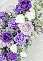 Artificial wedding ceremony floral arrangement, angled view of purple faux flowers and trailing greenery. Made in Melbourne by Flowers For Ever After, shipping Australia and Worldwide.