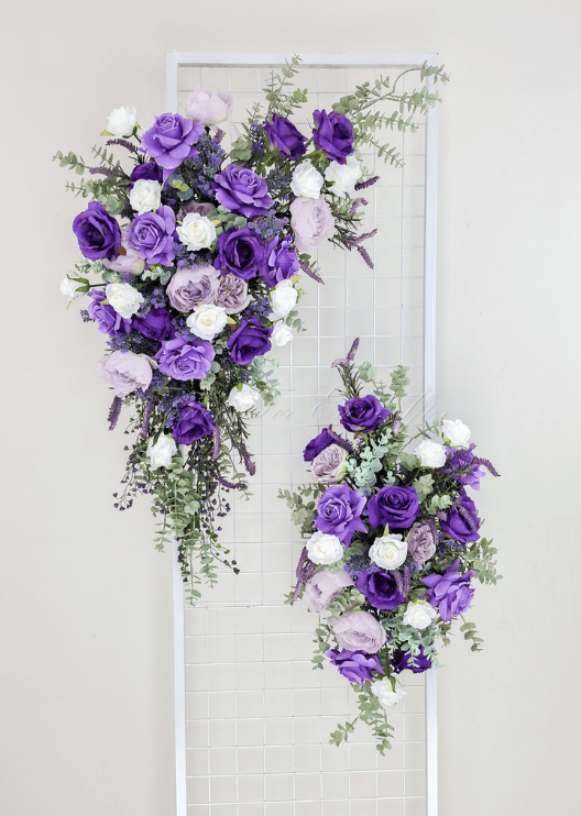 Artificial wedding ceremony floral pair with purple faux blooms and cascading green foliage. Made in Melbourne by Flowers For Ever After, shipping Australia and Worldwide.