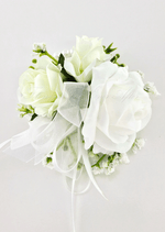Artificial wedding wrist corsage with white faux roses, tiny white flowers and trailing sheer white ribbons. For formals, proms and ball occasions. Made in Melbourne by Flowers For Ever After, shipping Australia and Worldwide.