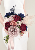 Artificial wedding bridal bouquet with mixed faux blooms, green leaves and wrapped stems. Made in Melbourne by Flowers For Ever After, shipping Australia and Worldwide.