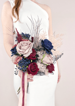 Artificial wedding bridesmaid posy, angled view of mixed faux flowers and green leaves. Made in Melbourne by Flowers For Ever After, shipping Australia and Worldwide.