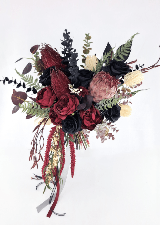 Artificial wedding cascading bridal bouquet, front view of burgundy and black faux roses, pink protea, spiky blooms and trailing foliage. Made in Melbourne by Flowers For Ever After, shipping Australia and Worldwide.